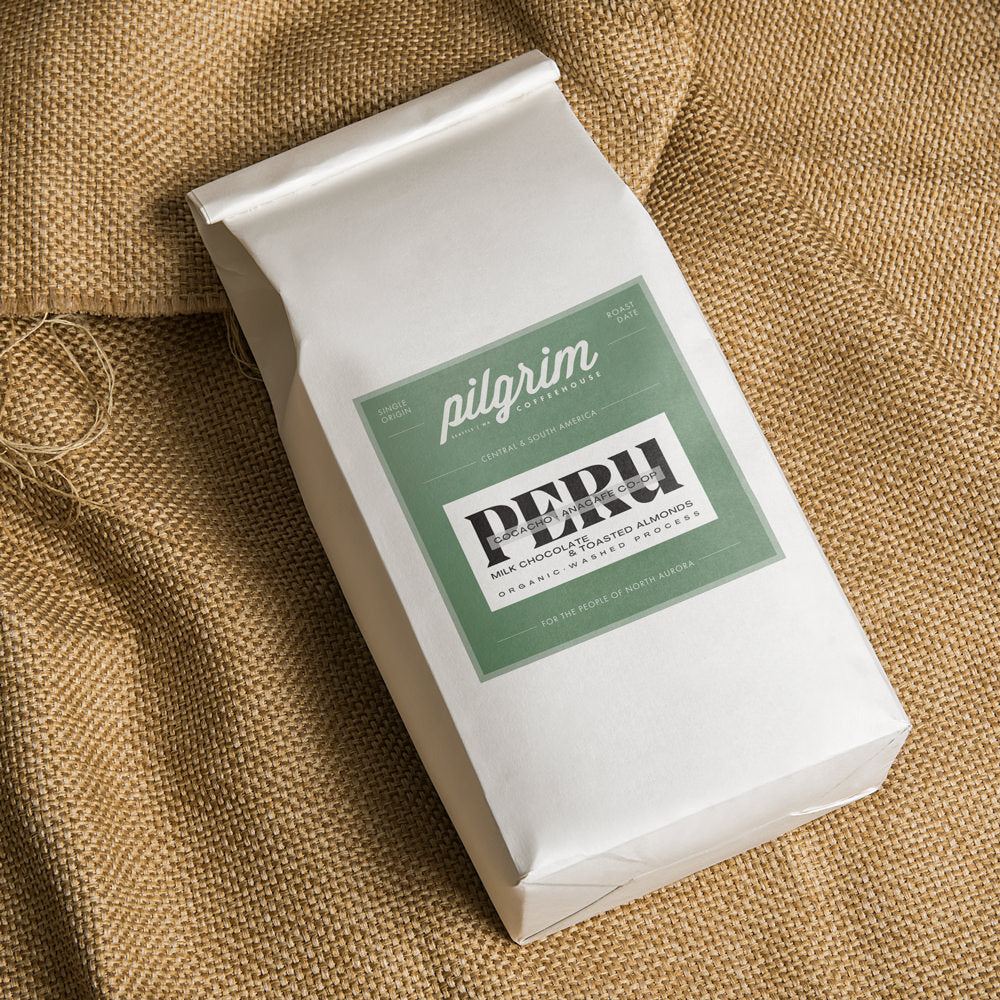 http://pilgrimcoffeehouse.com/cdn/shop/products/Peru-Pilgrim-Coffeehouse-Bag-Mockup_5603ec9c-a129-43aa-ad38-cfc6f5f3490a.jpg?v=1678467073